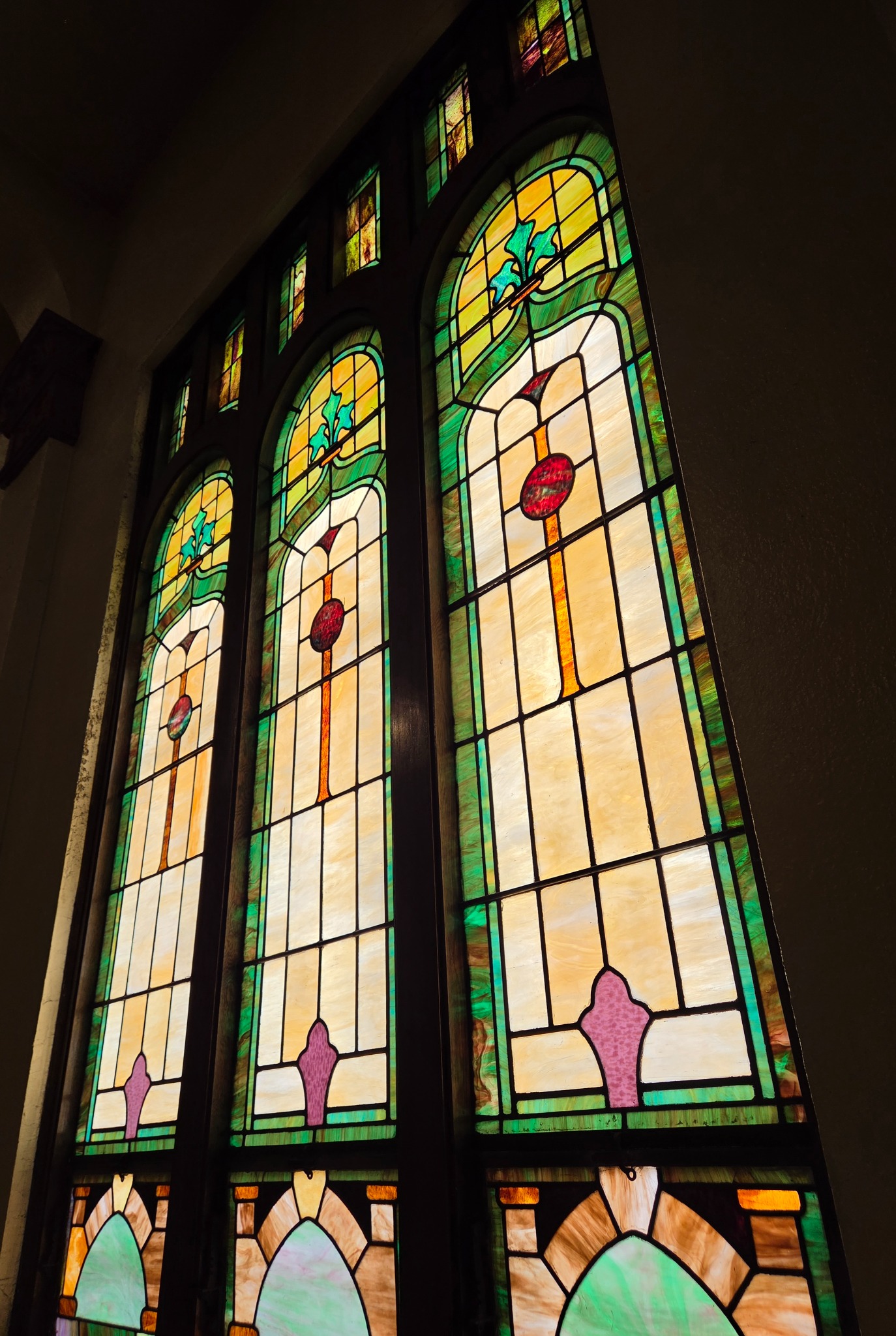 Angled view of stained glass windows at 404 South Arlington St in Akron, Ohio